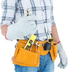 Technician with tool belt around waist holding pliers