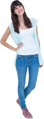 Obraz premium Portrait of happy woman standing with hand on waist