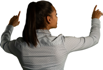 Rear view of woman touching invisible screen