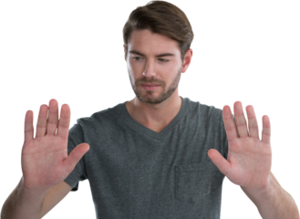 Man pretending to touch an invisible screen