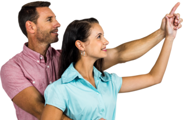 Smiling couple pointing away