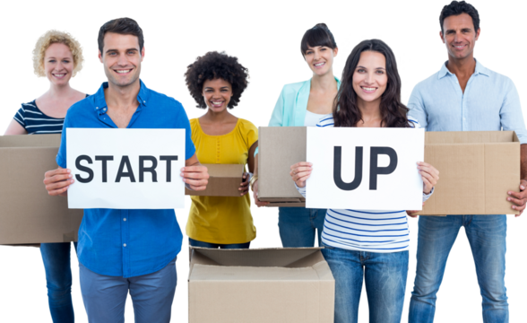 Creative business team holding cardboard written start up