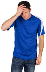 Disappointed football fan in blue
