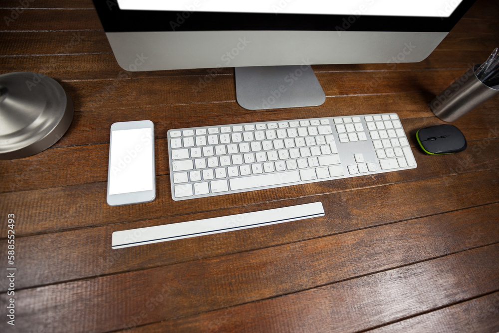 Poster office desk with computer and mobile phone