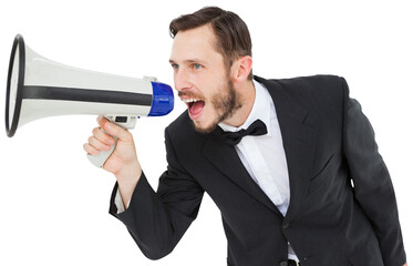 Naklejka premium Geeky businessman shouting through megaphone
