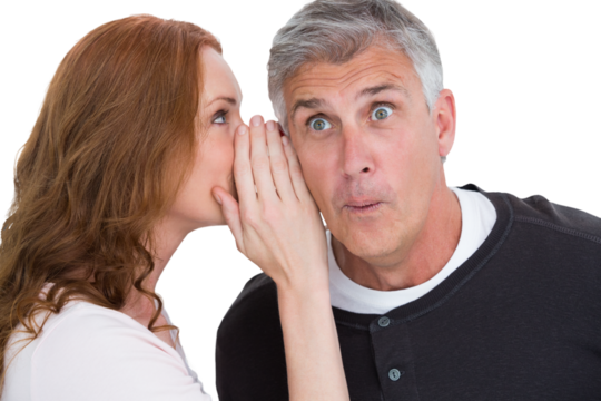 Woman telling secret to her partner