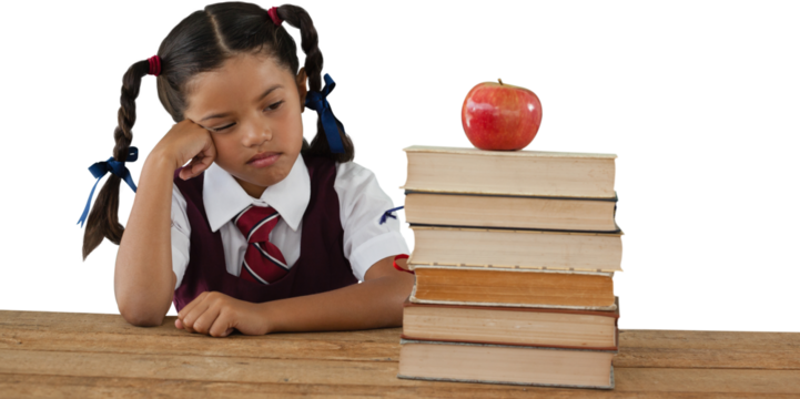Thoughtful girl by books and apple at desk - Powered by Adobe