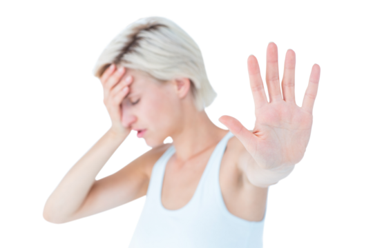 Sad blonde holding her hand 