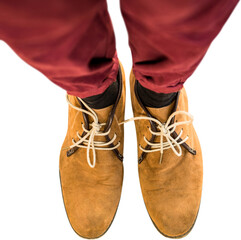 Man legs wearing brown shoes