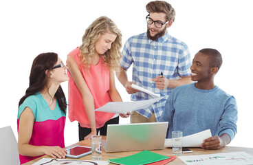 Happy business people discussing at desk 
