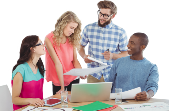 Happy business people discussing at desk 