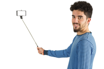 Casual man using a selfie stick