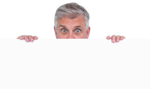 Casual man showing a poster