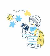 秋の紅葉を撮影する女性