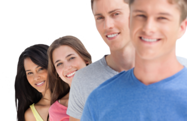 Four smiling people with a focus on the girls at the back