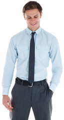 Smiling businessman standing with hand in pocket