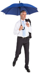 Happy businessman holding umbrella