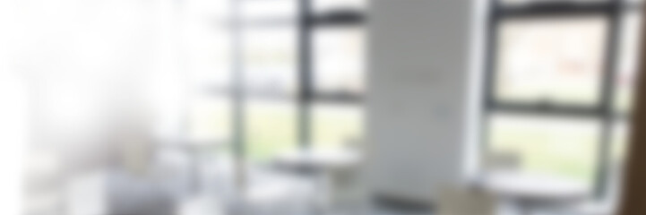 Blurred image of empty boardroom