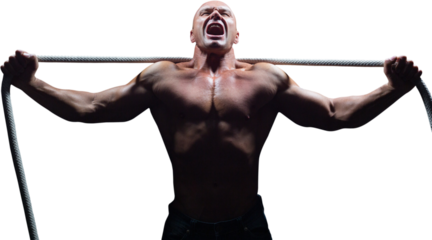 Aggressive man with arms outstretched holding rope