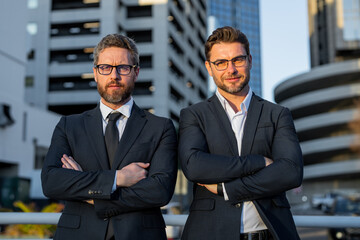 Business men crossed arms outdoor. Young hispanic businessman with arms crossed at the city. Business strategy. Innovation and marketing people. Financial management.