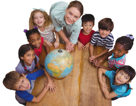 Cute pupils smiling around a globe in classroom with teacher