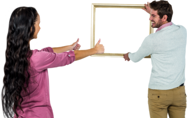 Smiling couple with picture frame