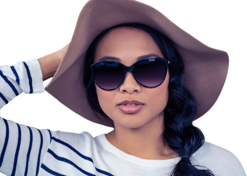 Attractive Asian woman with hat and sunglasses