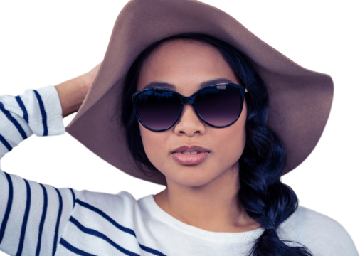 Attractive Asian woman with hat and sunglasses