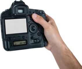 Cropped hand of photographer holding camera 