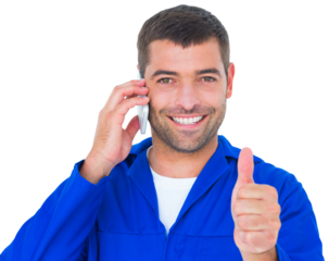 Mechanic using mobile phone while gesturing thumbs up