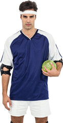 Sportsman standing with ball on white background