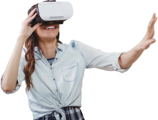 Happy young woman gesturing while using virtual reality simulator