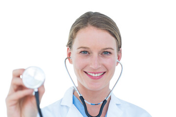 Smiling female doctor holding stethoscope
