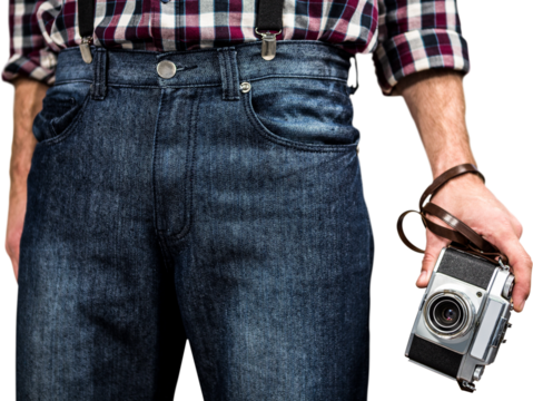 Hipster man holding digital camera - Powered by Adobe