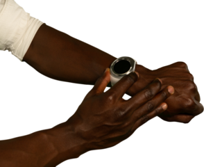 Mid-section of man using smartwatch