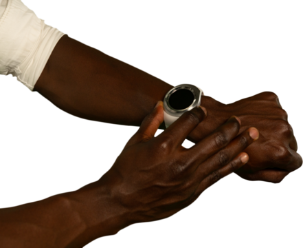 Mid-section of man using smartwatch