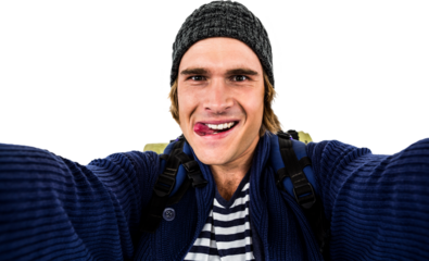 Backpacker holding the camera and grimacing