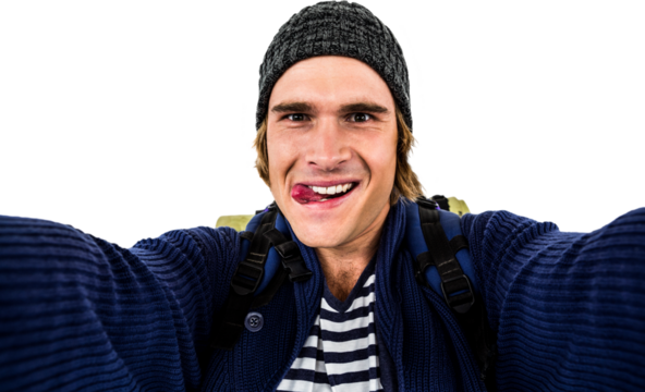 Backpacker holding the camera and grimacing