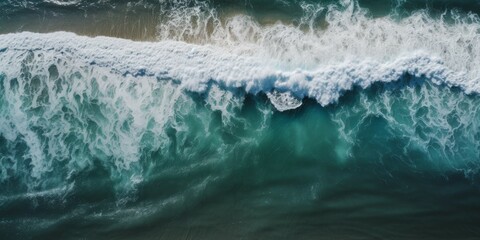 Fototapeta na wymiar Spectacular top view of tropical sea waves from drone