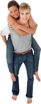 Young boy giving his girlfriend piggyback ride