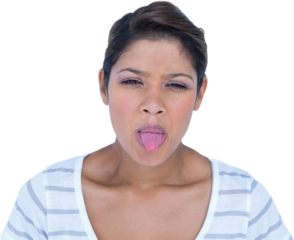 Portrait of beautiful woman sticking her tongue out
