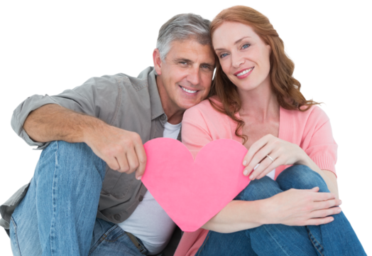 Casual couple holding pink heart - Powered by Adobe