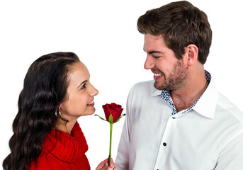 Obraz premium Smiling couple holding rose