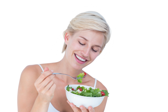 Beautiful blonde woman eating salad