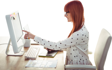 Smiling hipster woman using graphics tablet and pointing screen