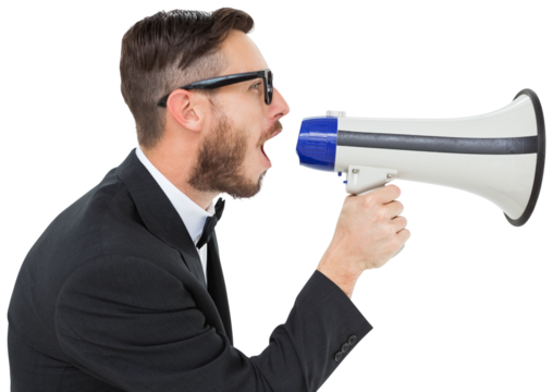 Geeky businessman shouting through megaphone