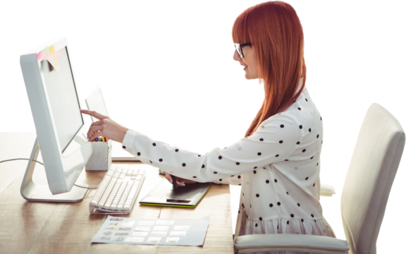 Smiling hipster woman using graphics tablet and pointing screen