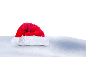 Obraz na płótnie Canvas Santa hat on snow
