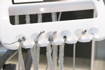 Close up scaling and root planing equipments at dentist clinic office. Selective focus of dentistry...