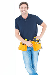 Man with tool belt around waist against white background